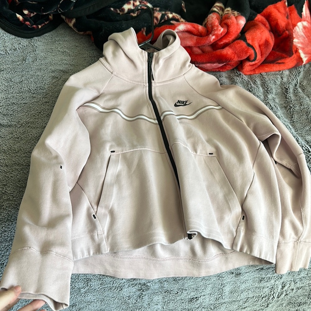 Pink women’s Nike tech